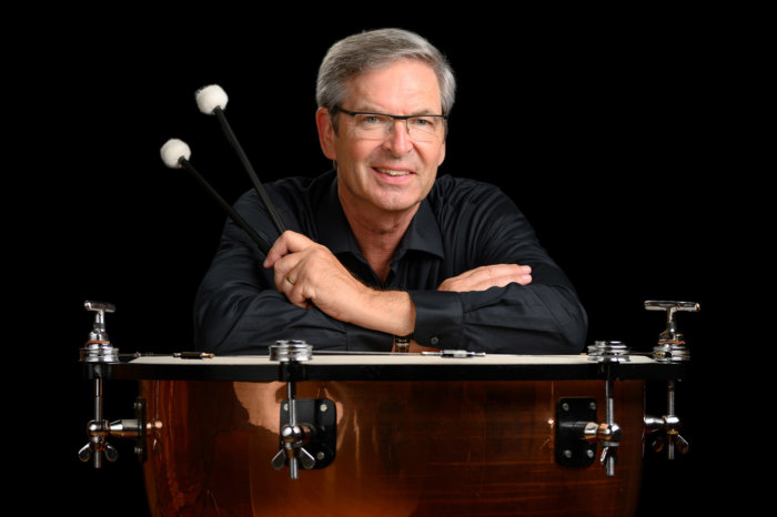 Bob leaning on a drum