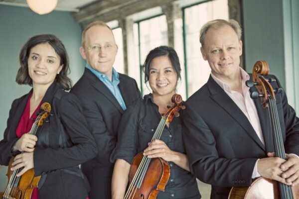 the Arianna String quartet, four musicians with their stringed instruments