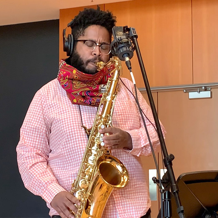 Christopher playing saxophone