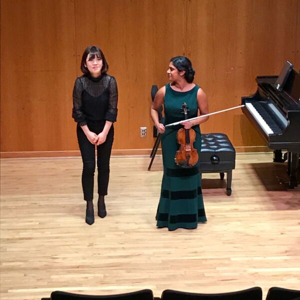 Music professor Seongkyeong Kim with her violin student, Claire Miller