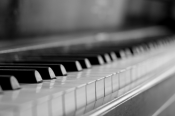 piano keys in black and white photo
