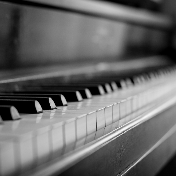 piano keys in black and white photo