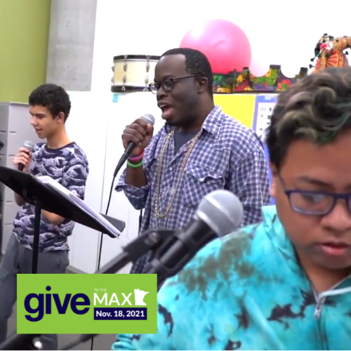 Three students singing together