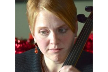 Close up of Andrea playing cello