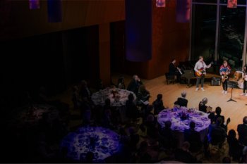 View of a performance in Antonello Hall at night