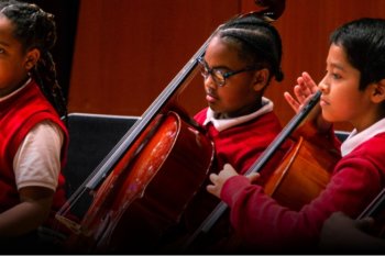 group of student performing cello