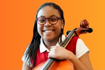 Student holding a cello