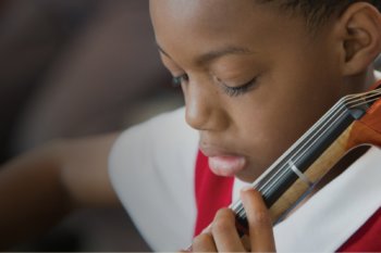 student playing cello