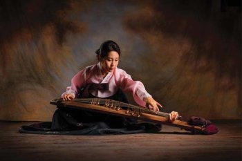 Person playing a gayageum