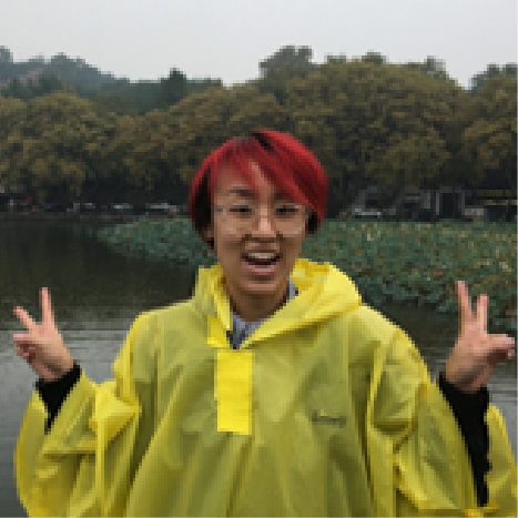 Minna wearing a yellow rain poncho