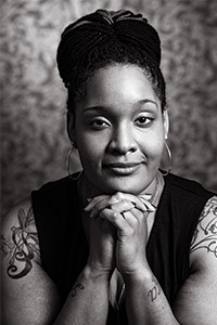 PaviElle's headshot in black and white
