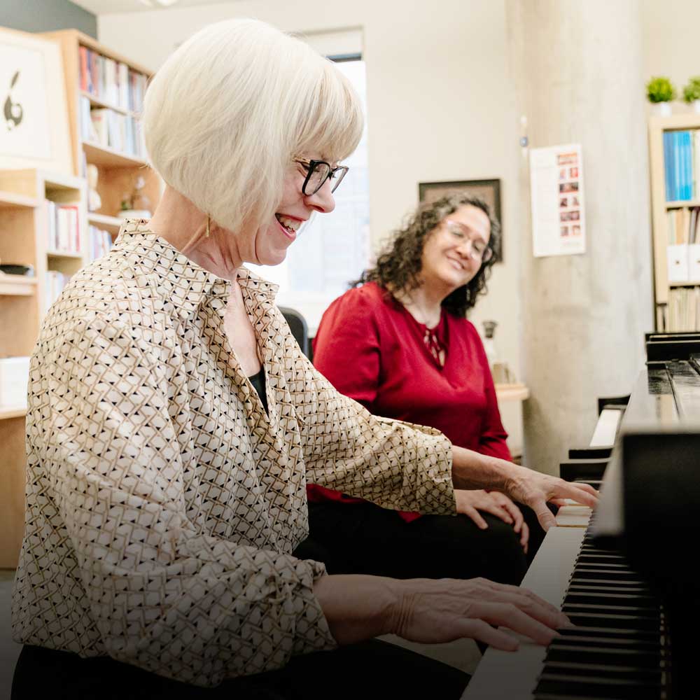 Piano student and teacher