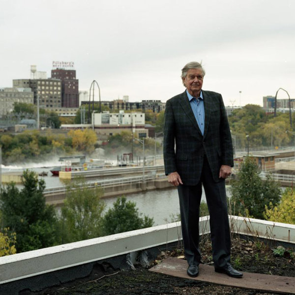 Paul standing with Mississippi river behind him
