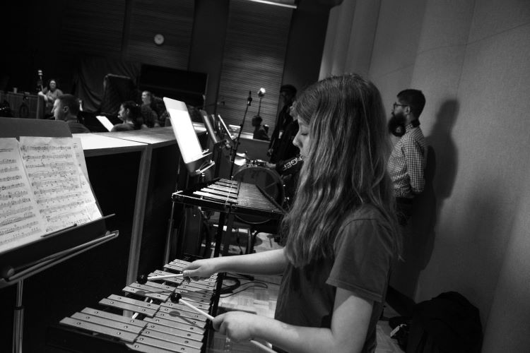 Students playing xylophone