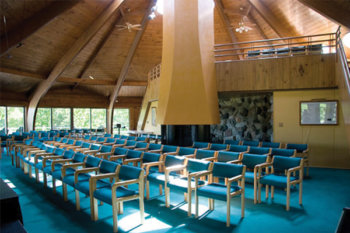 Large room with blue chairs