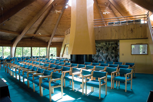 Large room with blue chairs