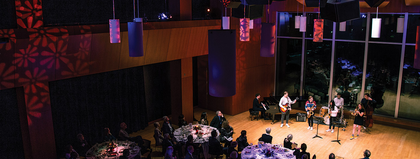 Artists performing on stage in Antonello Hall