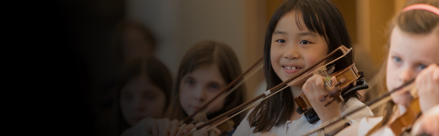 Kids playing string instruments