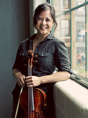 Joanna holding a viola