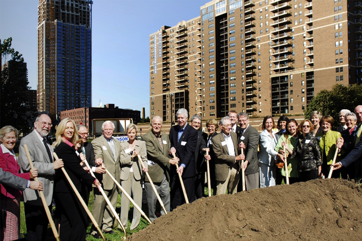 Group of people holding shovels at the MacPhail Minneapolis building site
