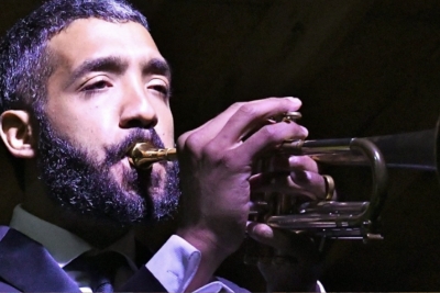 Omar playing trumpet