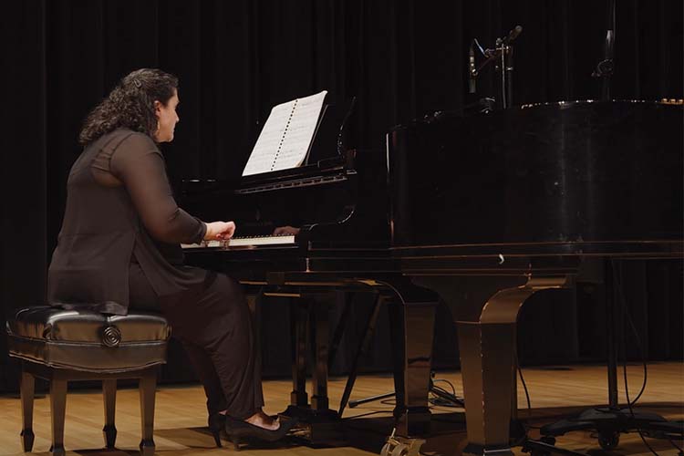 Person playing piano