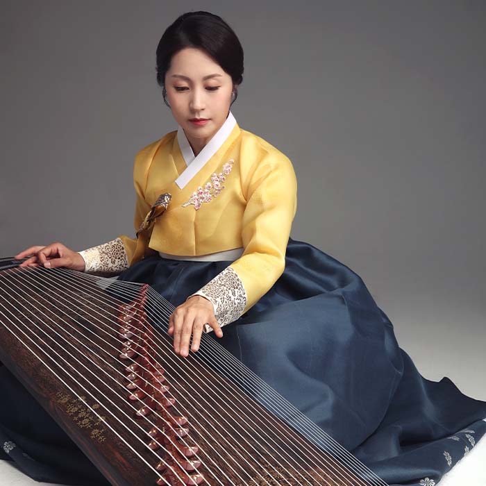 Person playing a gayageum