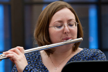 Adult student playing flute