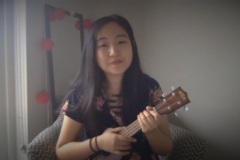 Teacher holding a ukulele